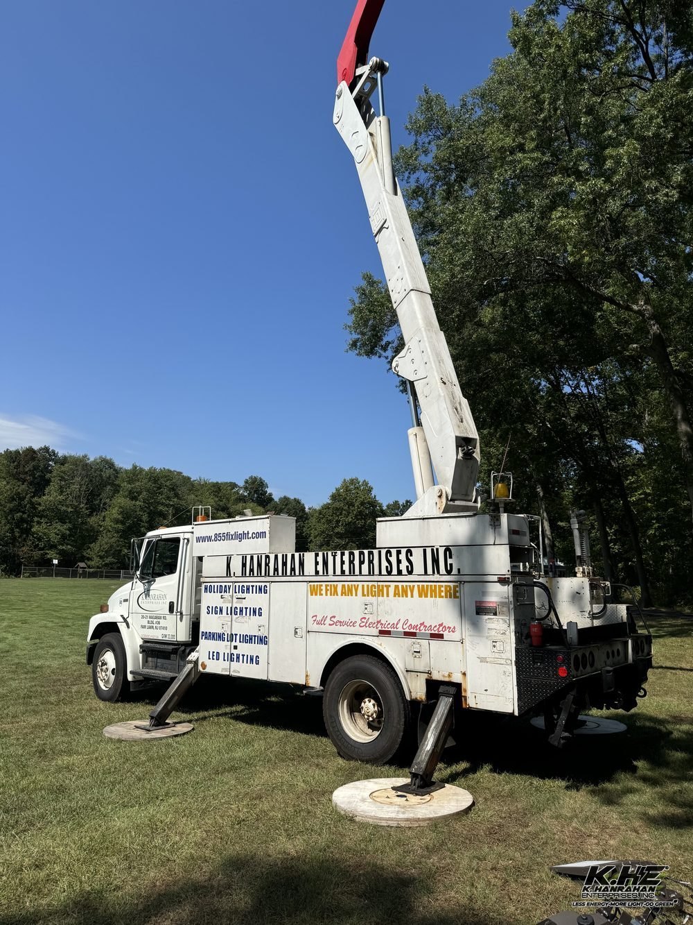 KHE bucket truck on field lighting job