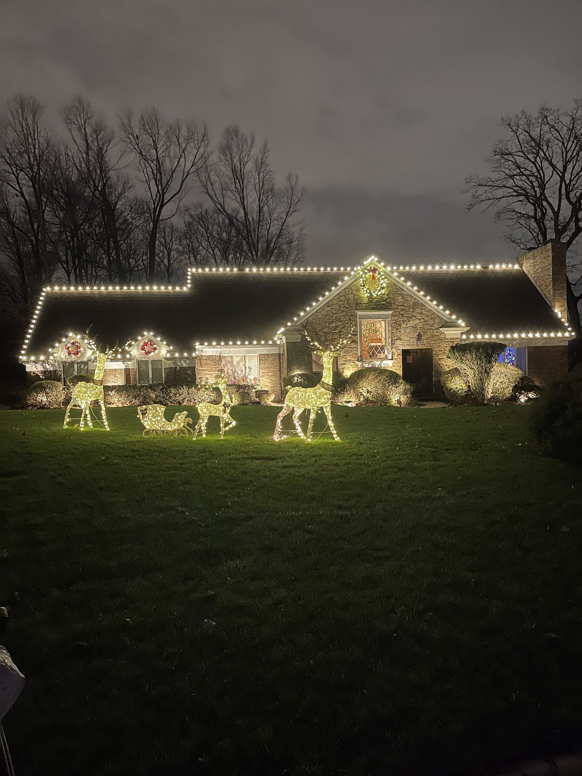 Stone cottage with reindeer figurines