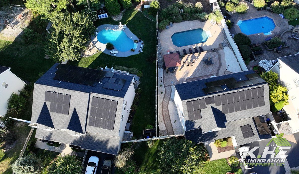 Drone view of solar install with pools visible