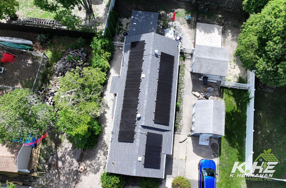 Drone view of long ranch with solar array